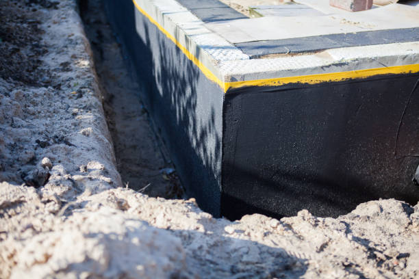 Professional Basement Waterproofing technician working in Prairieton, IN